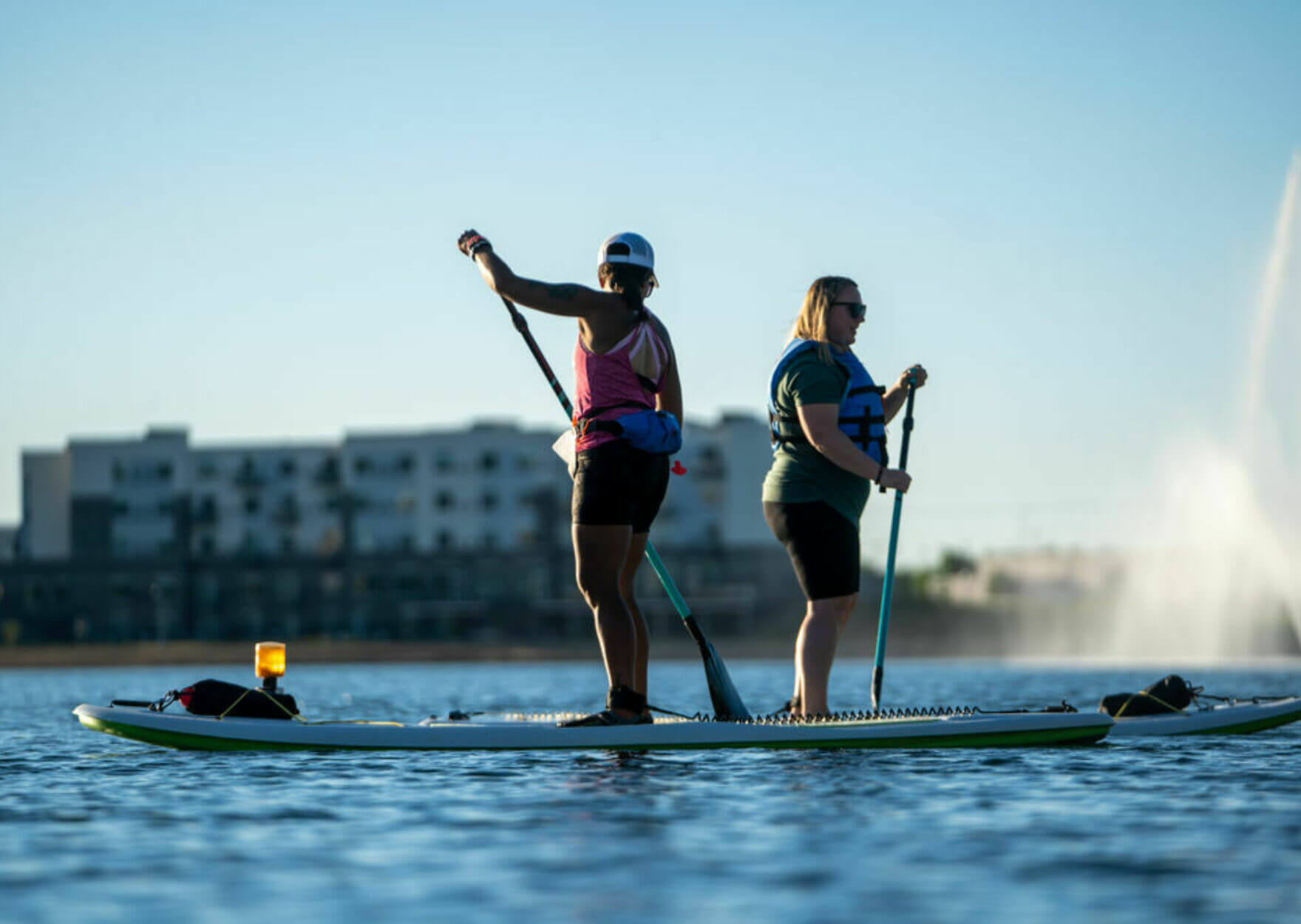Two people paddleboarding on Lake Lorraine