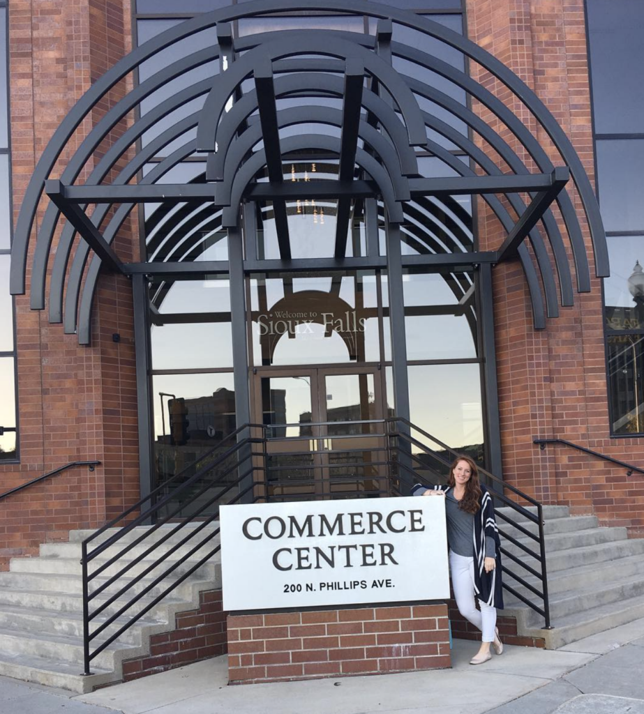 Kayla in front of the Chamber building